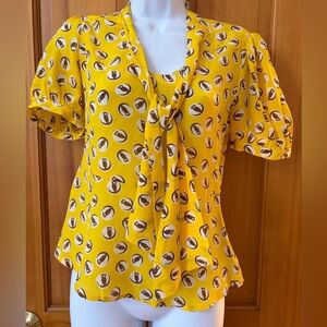 Yellow silk blouse